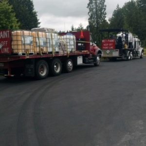 On their way to work. Stripe Rite Trucks with Paint