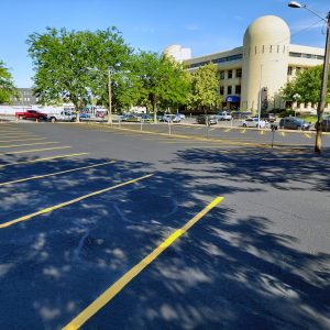 Again, check out this Smooth & sleek parking lot in Spokane. Firstly, we did Crack Fil. Secondly, we Seal coated. Lastly, we striped. In conclusion, call us today for quality work.