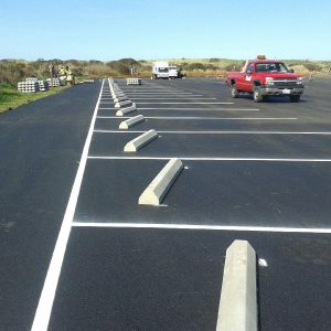 This parking lot in Keyport is stunning. Firstly, we seal coated. Secondly, we striped. Furthermore, we installed wheel stops.