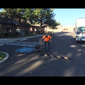 Yakima Crew working on a Parking lot. Rubber form Speed Bumps, Lot Striping, and more!